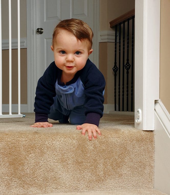 Crawling baby approaching stairs Crawling baby approaching stairs